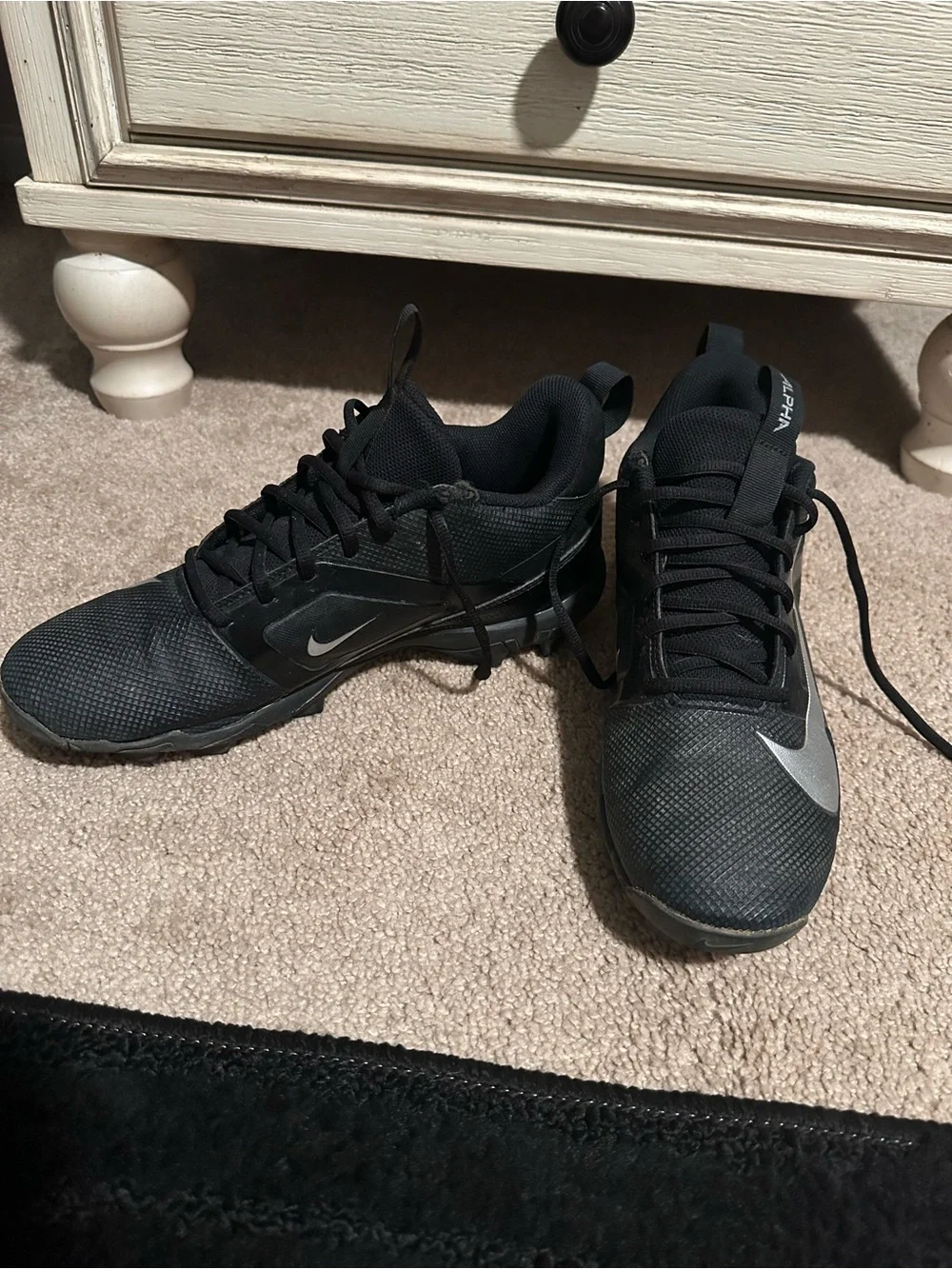Nike Men's Black Baseball Cleats with White Swoosh